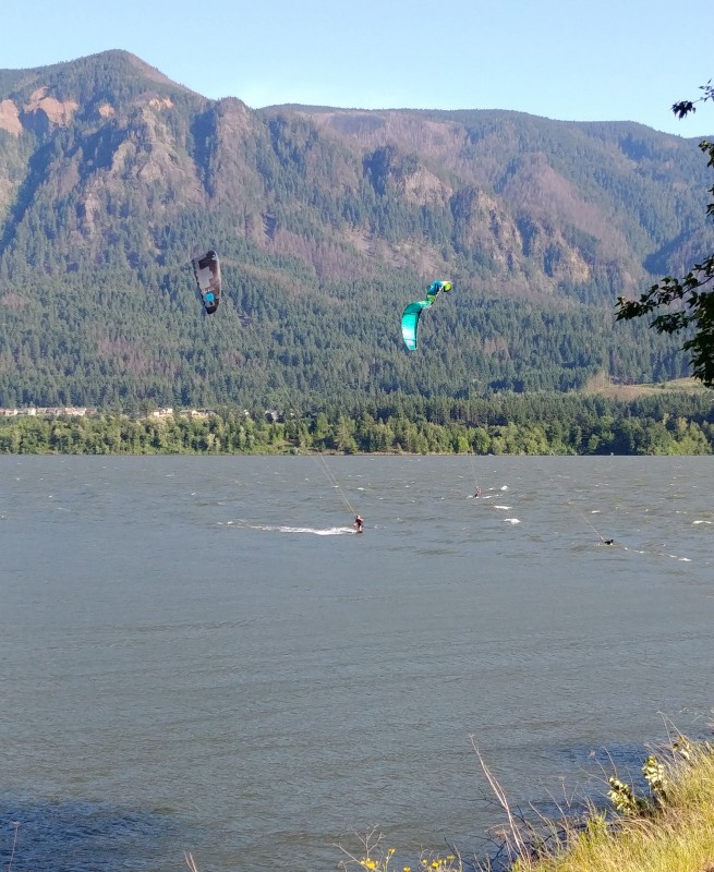  View of a windsurfer from the walking path – 