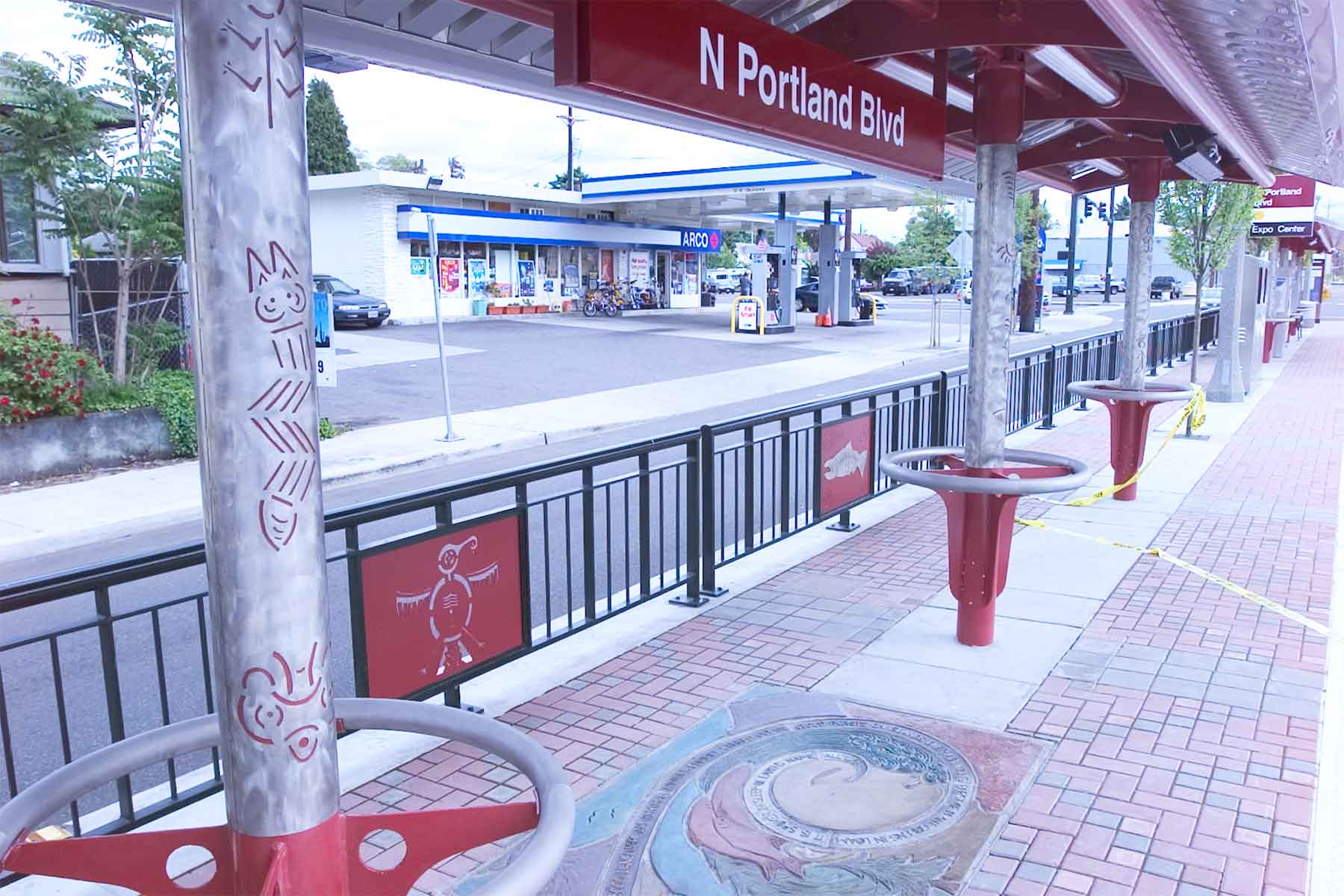 Trimet Light Rail Portland Blvd. Lillian Pitt was team leader of five Native American members to complete this station. I designed the bricks into a basket design, the fence railings, and the gable ends.